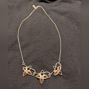 Silver necklace with red beads